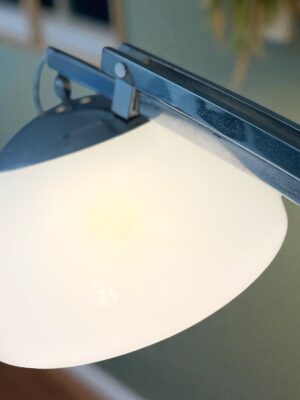 Close-up of the dome-shaped acrylic diffuser on vintage floor lamp