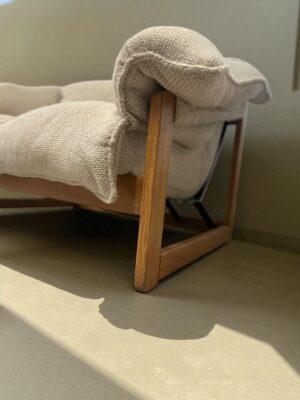 Full frontal view of the loveseat with curved armrests