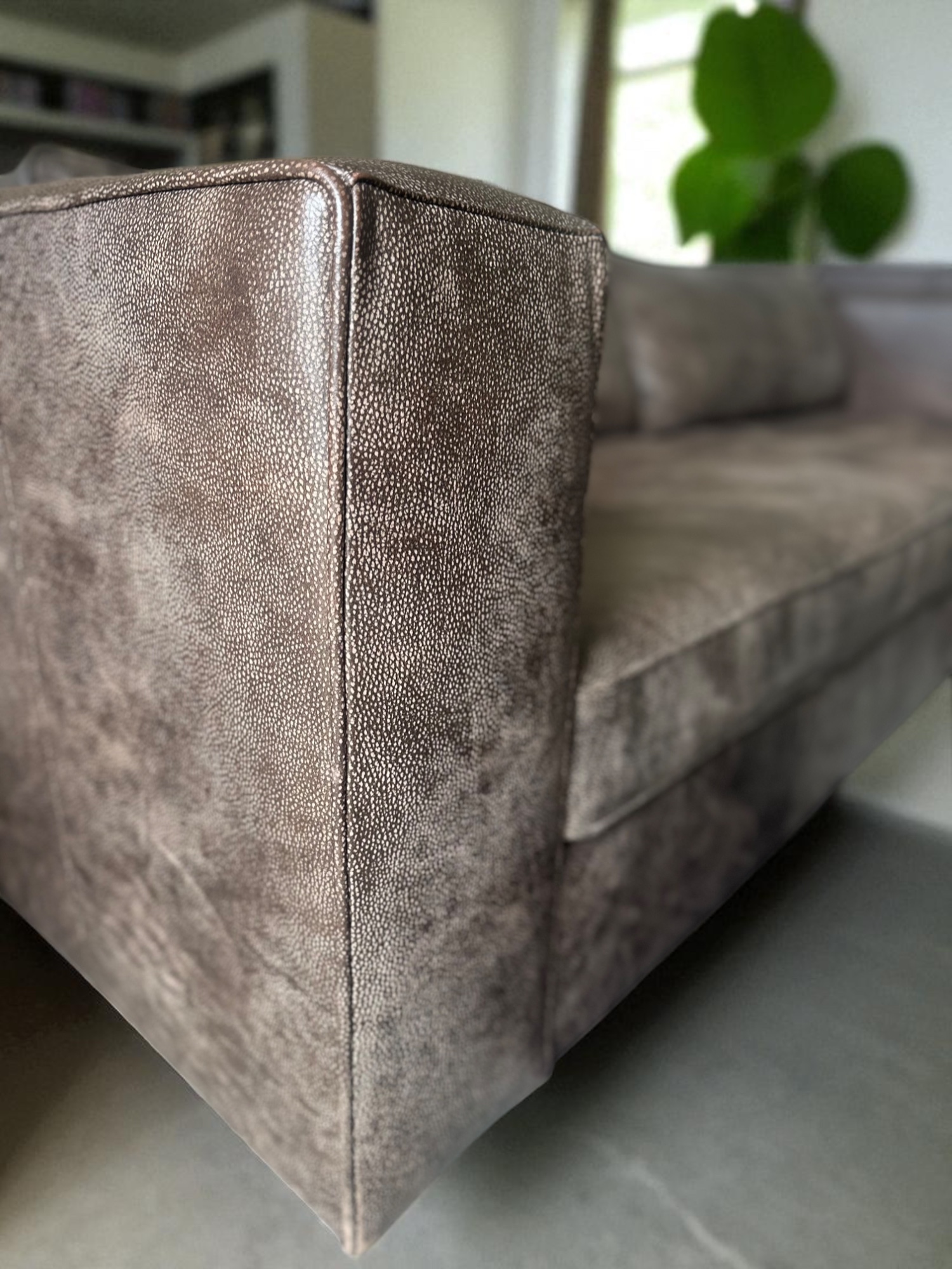 Close-up of genuine leather 3-seater sofa