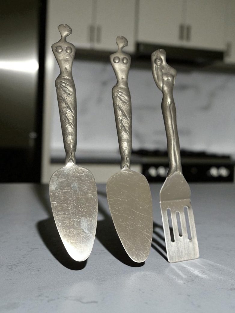 Slotted spatula and servers with iconic pewter handles
