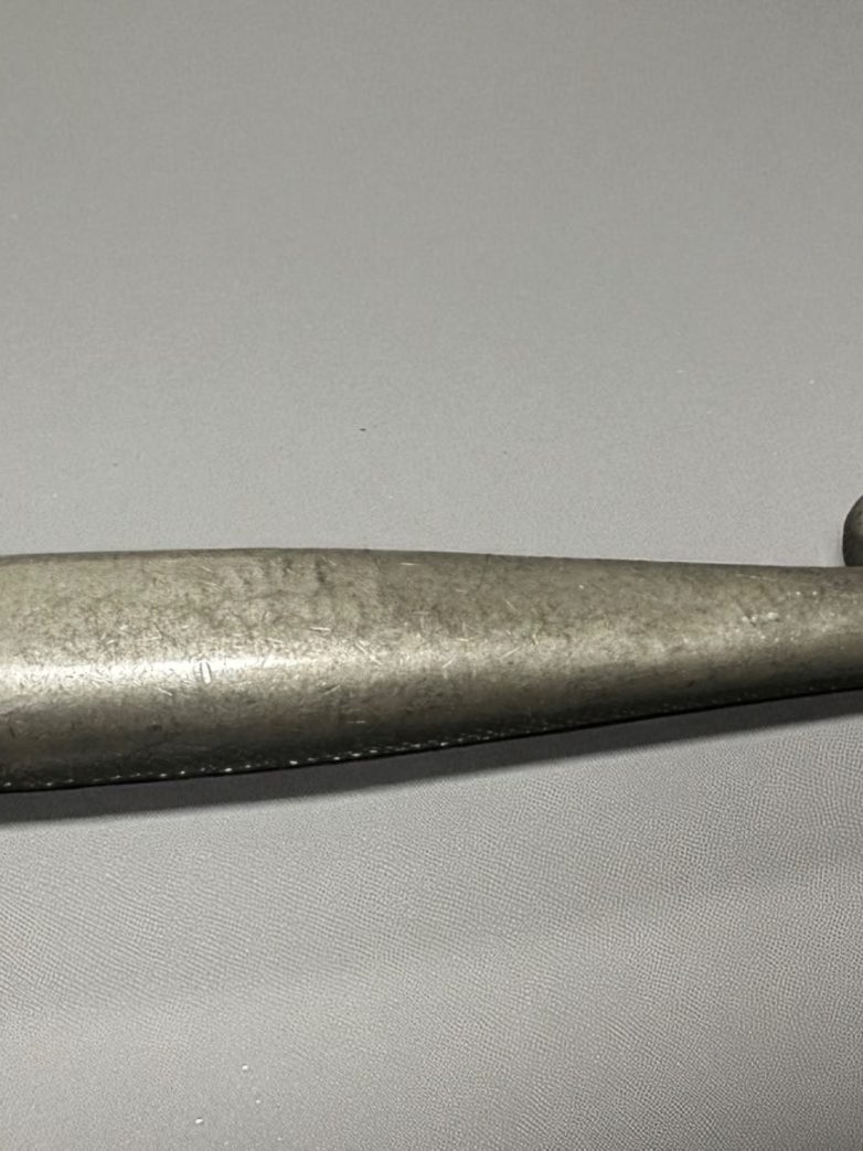 Pewter handle with spiral detail – close-up