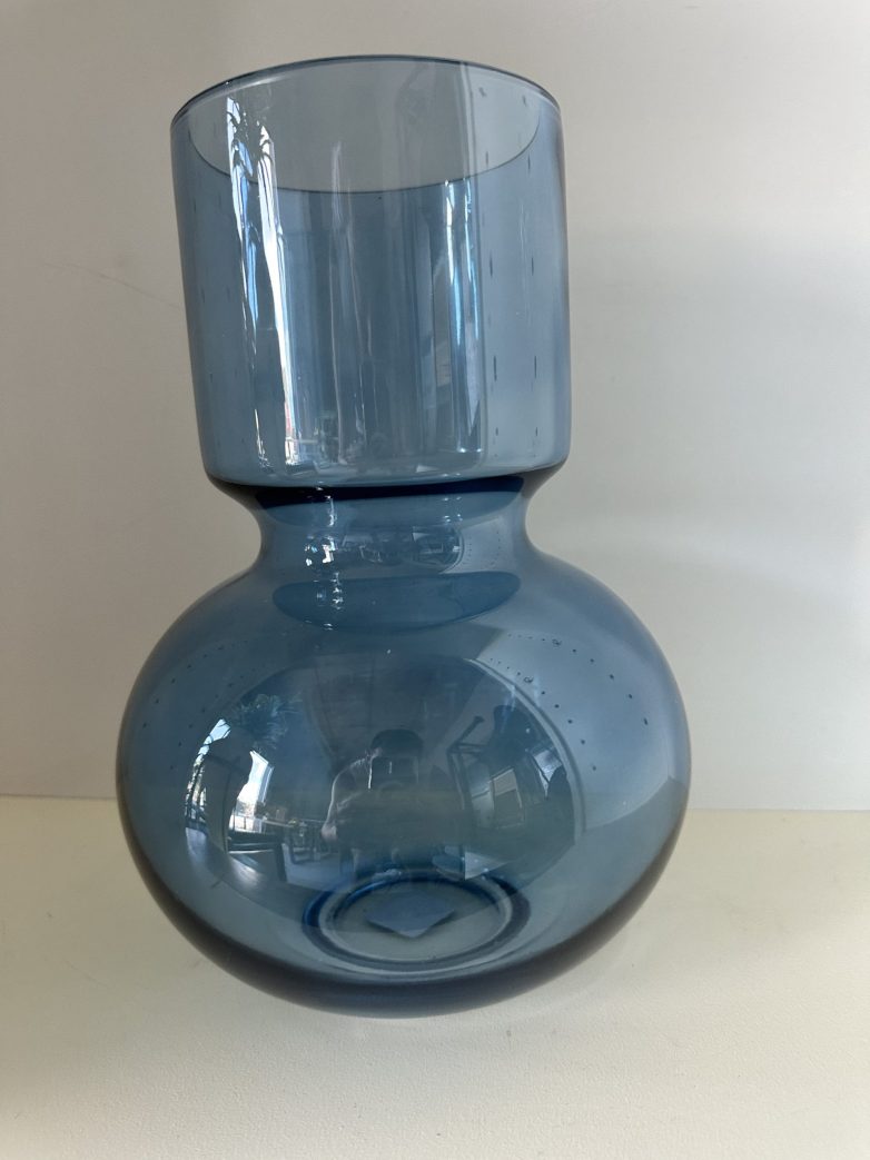 Mouth blown blue vase